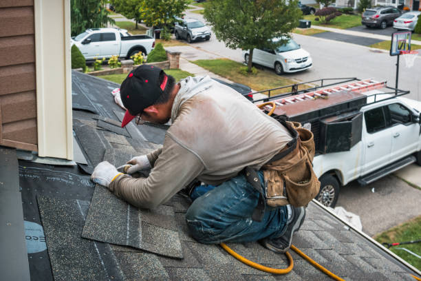 Professional Flat Roof Repair technician working in Winchester, MO